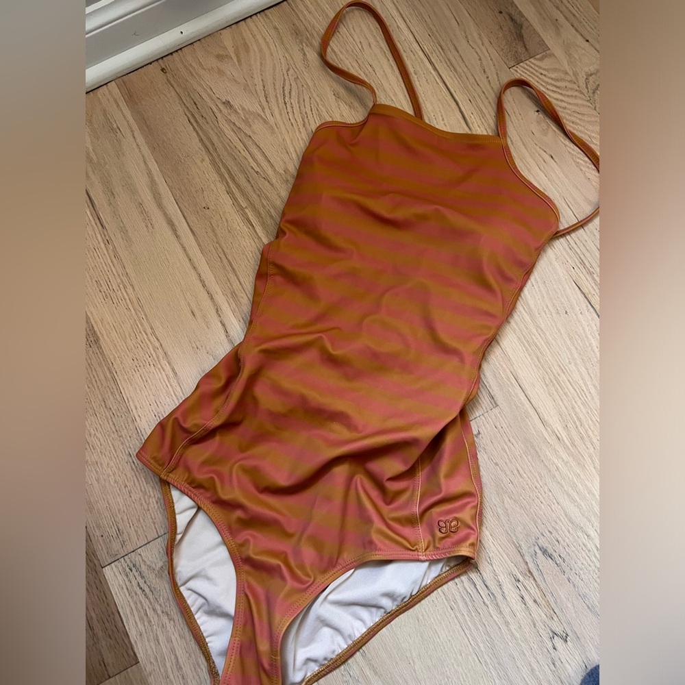 Size M Albion The Stevie: Orange Stripe, tie-back swimsuit.